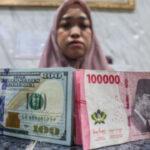 Rupiah Mengakhiri Pekan dengan Penurunan Tipis, Terpaut Rp16.836 per Dolar AS